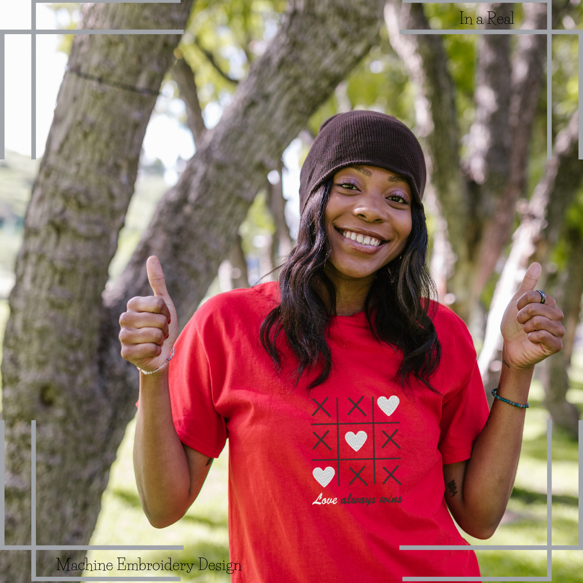 "Love Always Wins" Valentine's Tic Tac Toe Machine Embroidery Design is featured on a T-shirt