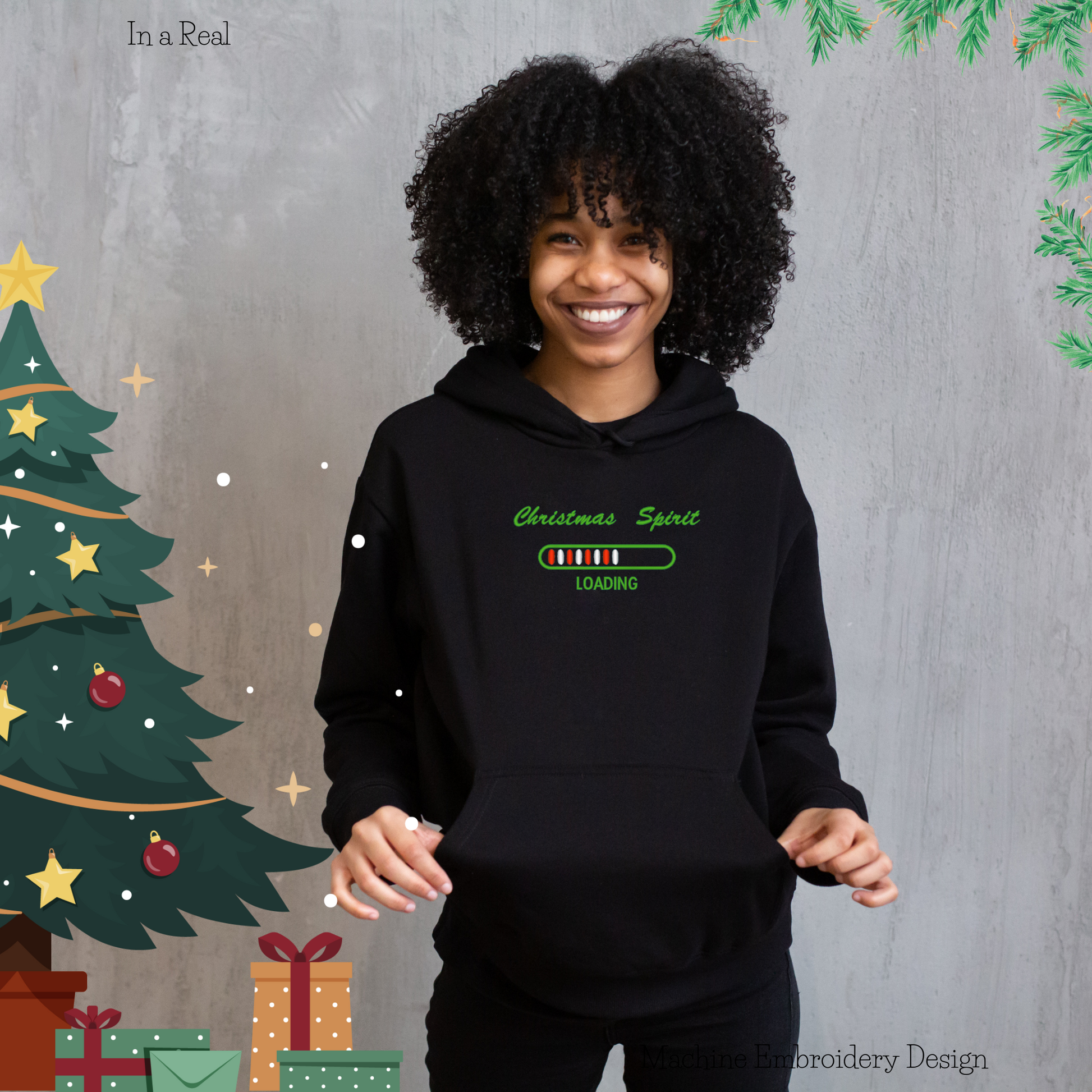 Machine embroidery design: 'Christmas Spirit Loading' — Festive and whimsical holiday-themed text displayed on a hoodie