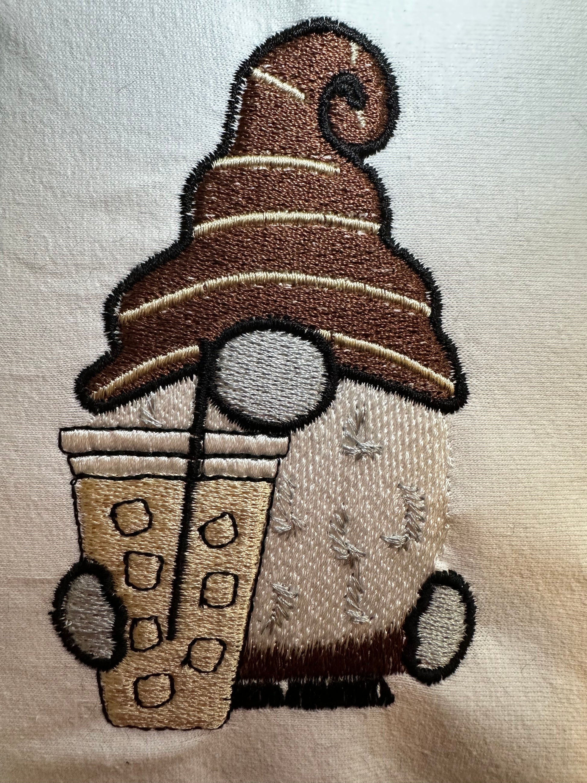 Machine embroidery design: Adorable gnome enjoying iced coffee