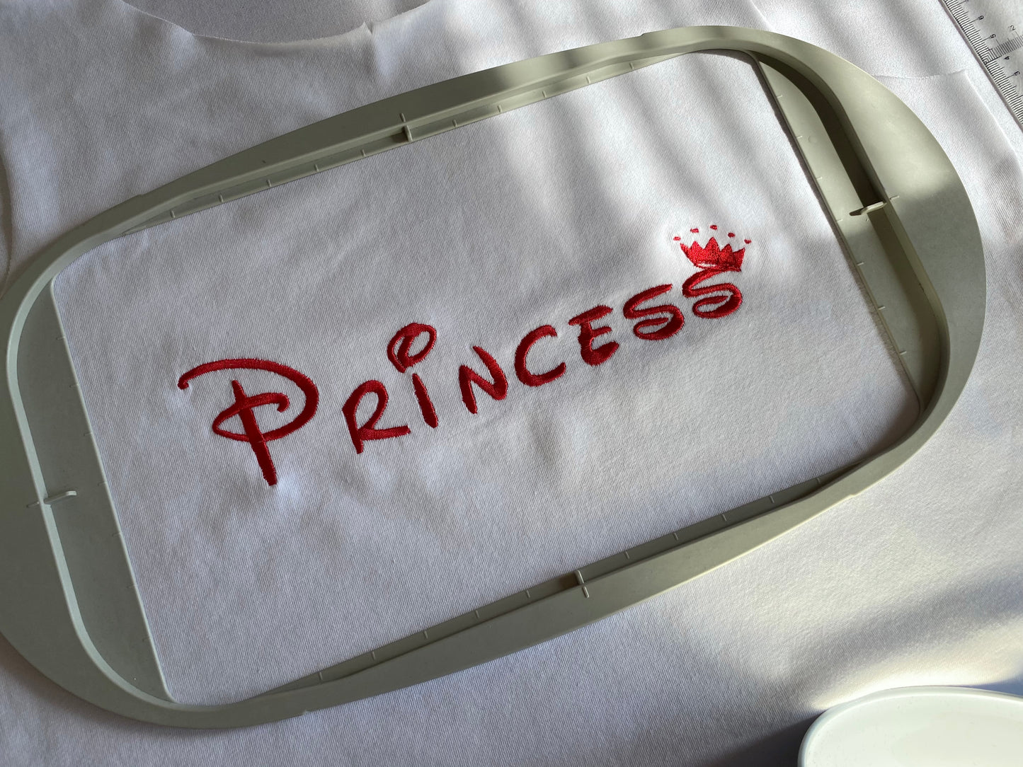 Princess machine embroidery design resembling Disney font