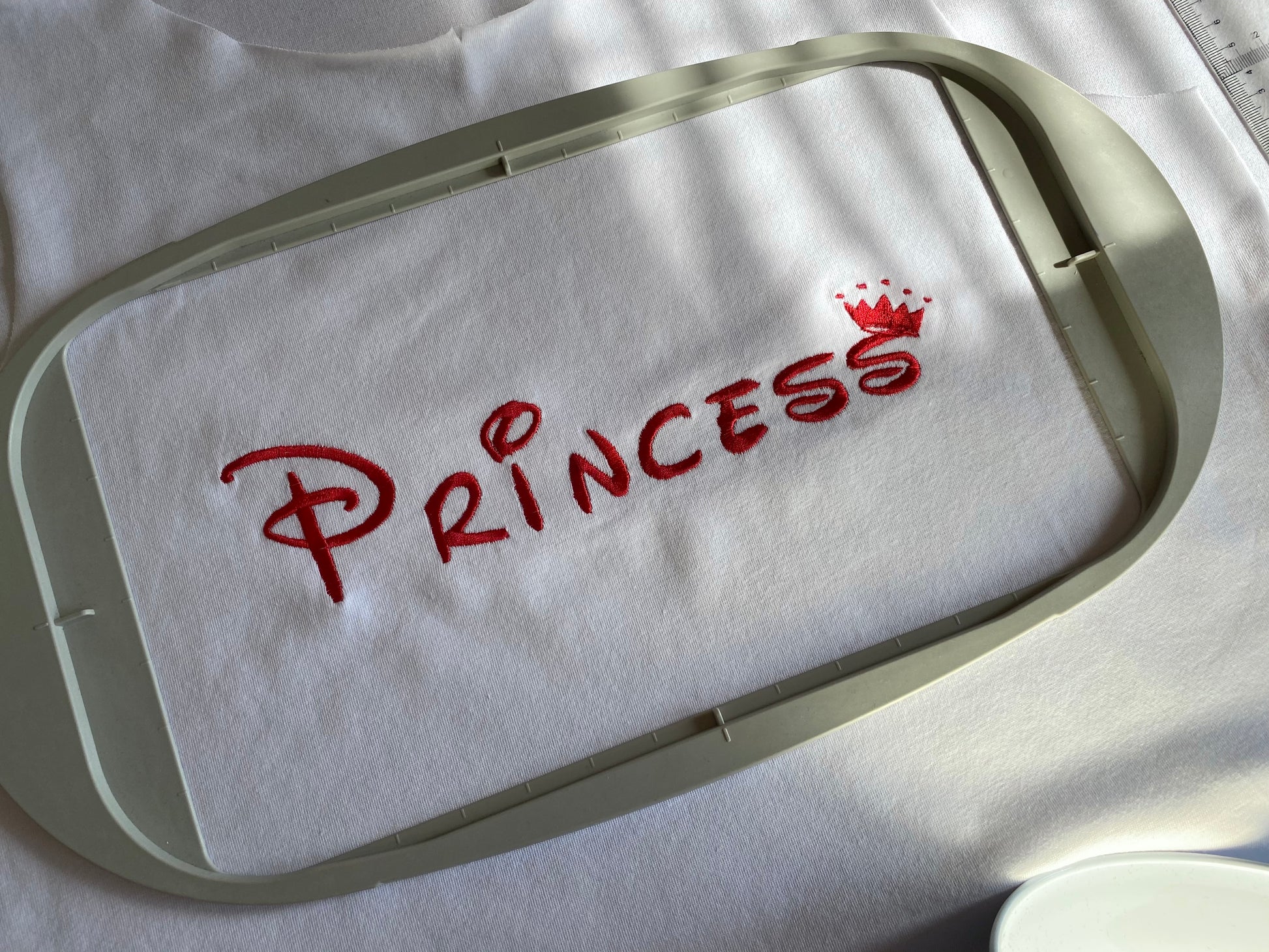 Princess machine embroidery design resembling Disney font