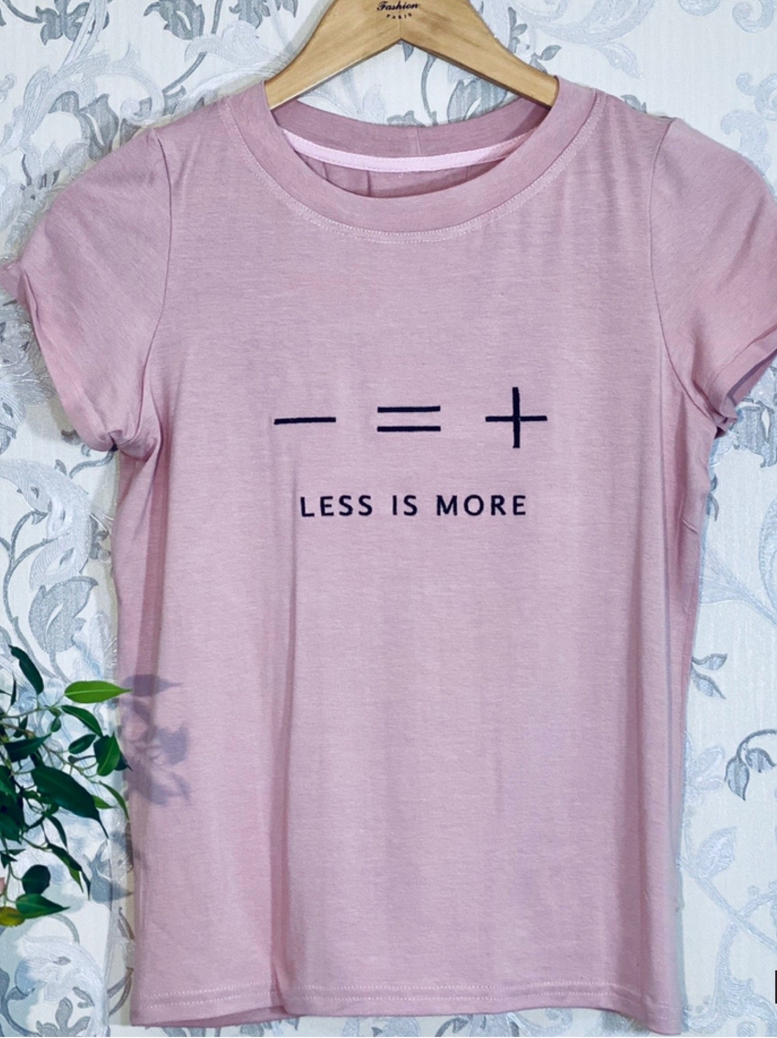 Less is More Machine Embroidery Design displayed on a T-SHirt