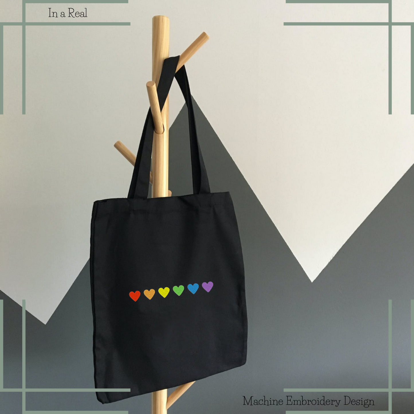 The Rainbow Hearts machine embroidery design is displayed on a tote bag 