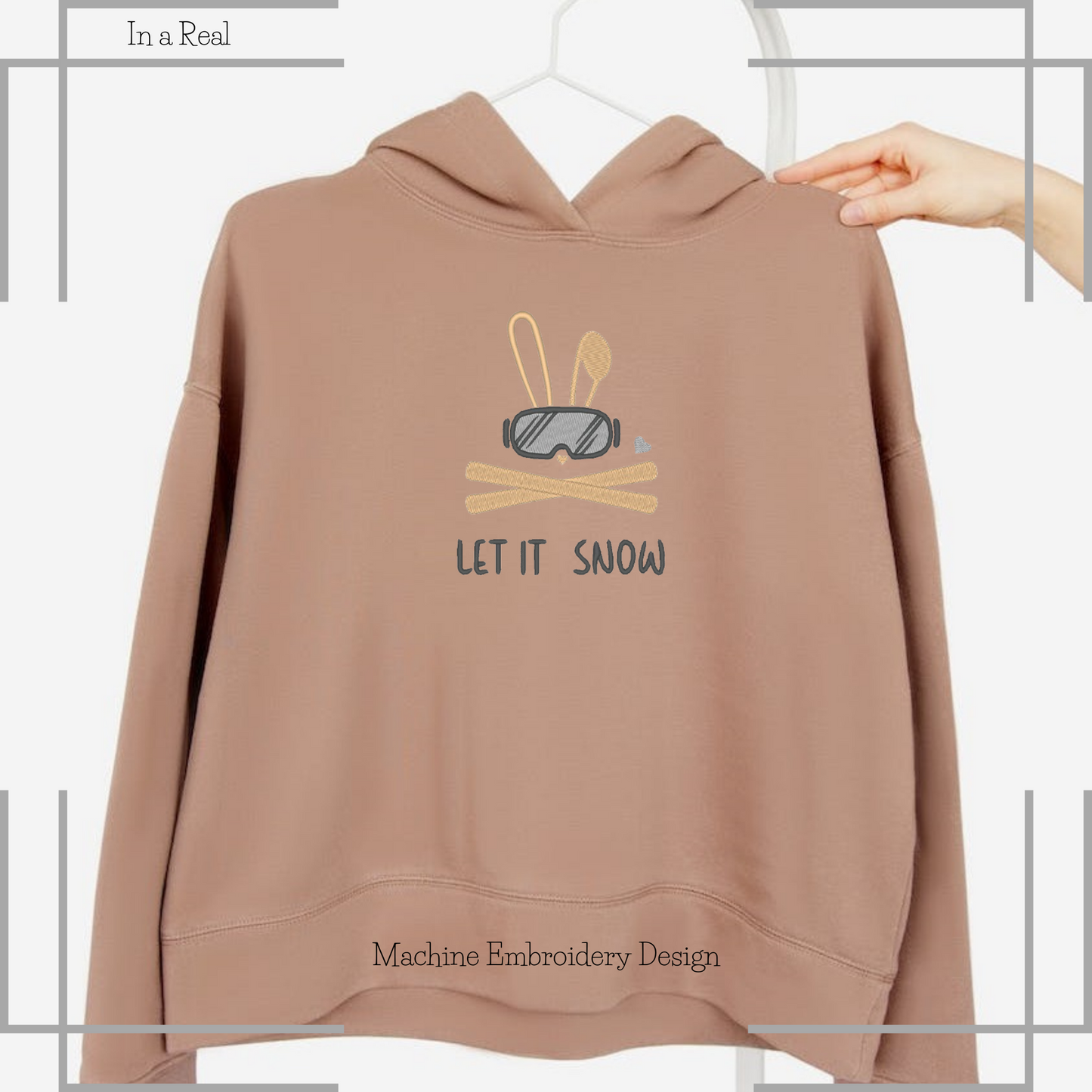 Machine embroidery design: Playful skiing bunny with the 'Let It Snow' phrase displayed on a Hoodie