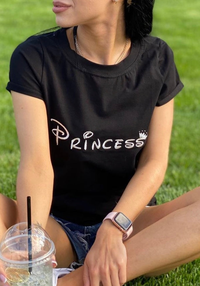 Princess machine embroidery design, reminiscent of the Disney font, showcased on a t-shirt