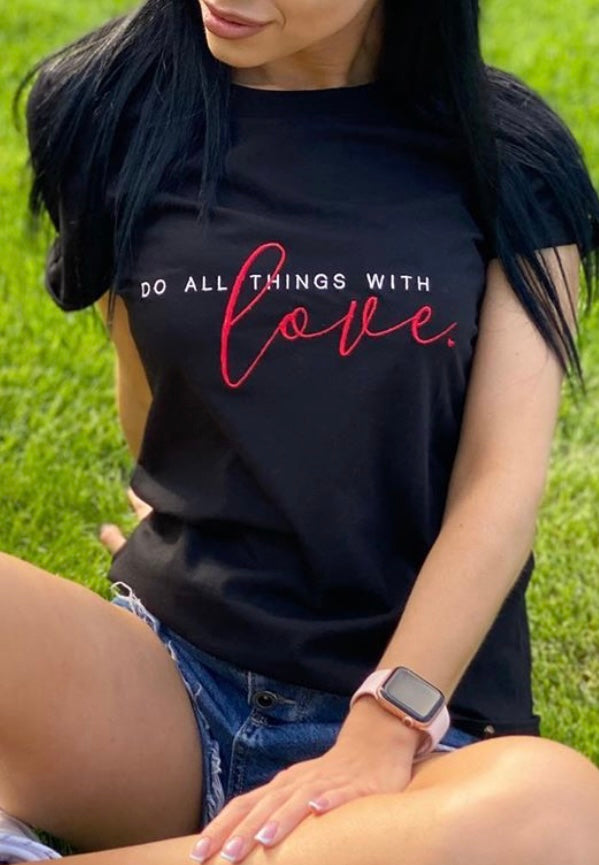 Embroidery design with the phrase 'Do all things with love' written in stylish lettering