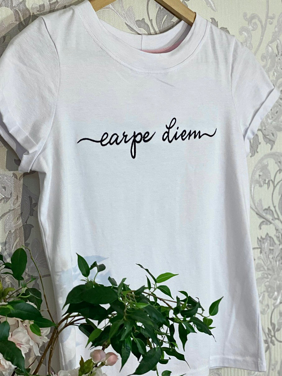 Stylish 'Carpe diem' embroidery design adorning a t-shirt